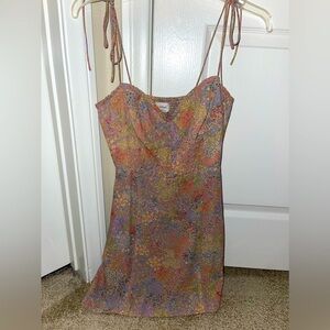 Aritzia cream mini dress with colorful flowers